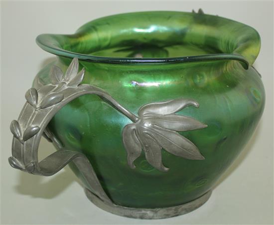 A Loetz style Art Nouveau iridescent green glass and pewter mounted bowl, c.1905, width 44cm